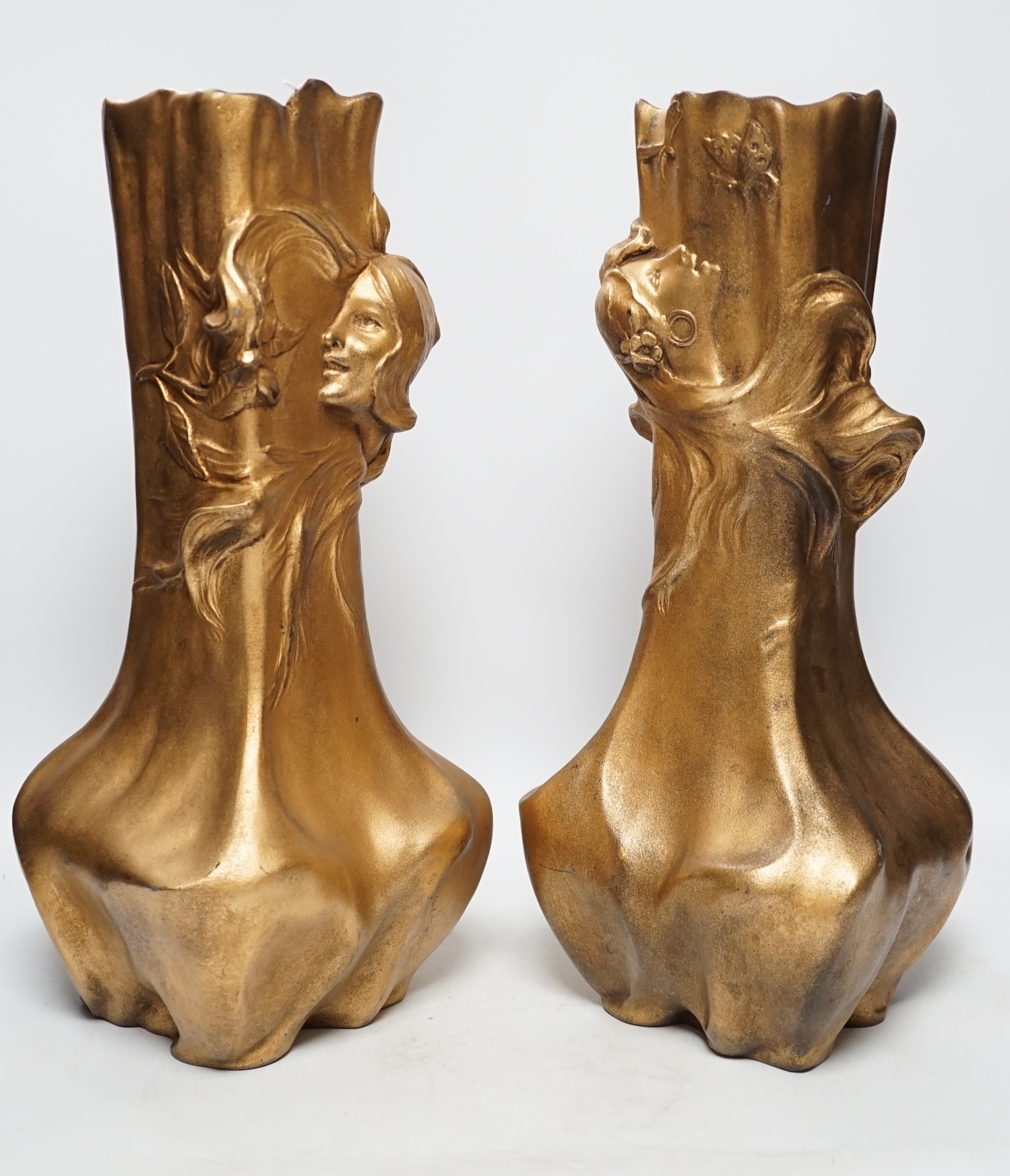 A pair of Art Nouveau figural gilt metal vases, 42cm high